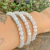 Pulseira de Selenita Branca Lapidada 6mm - Limpeza Energética - loja online