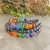 Pulseira de Hematita 7 Chakras Lapidada 6mm - Cristais Topázius