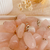 Pingente de Quartzo Rosa Rolado Prateado - Amor - comprar online