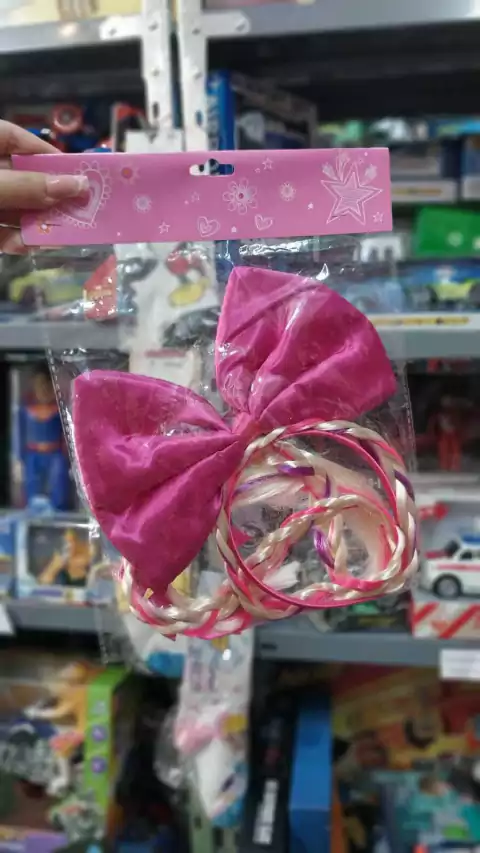 Trenza rapunzel con moño sebigus