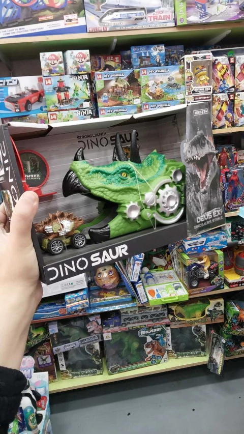 Dinosaurio lanzador con autito y obstaculos importado - comprar online