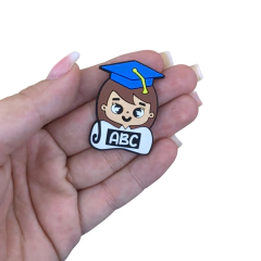 APLIQUE ESTUDANTE FORMATURA EMBORRACHADO - CABELO CASTANHO - 4CM - 2 UNIDADES - comprar online