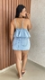 Saia Flora Jeans Curta Barra Desfiada Com Bolsos Crisconf na internet