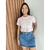 Mini Saia Jeans Claro Barra Desfiado - comprar online