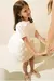 MINI SAIA CAMILA OFF WHITE na internet