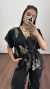 Macacão Viscose Decote Marisa Estampado Preto na internet