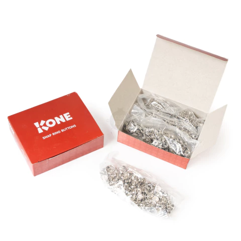 Broche Doble Aro Bronce Niquelado Marca Kone 9.5mm x 200 unidades - comprar online