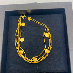 PULSERA DORADA TRIPLE en internet