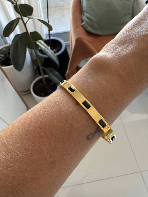 Esclava leven con baguette negra acero gold