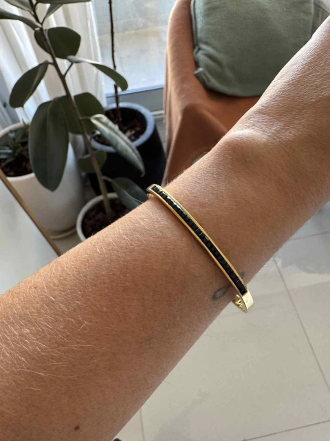 Esclava Rita con baguette negra acero gold