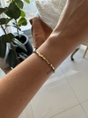 Pulsera elastica cuadraditos gold - comprar online