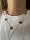 Collar 5 margaritas negras acero gold