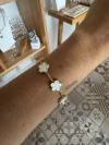 Pulsera con 5 margaritas nacar acero gold