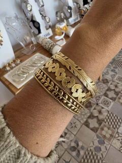 Brazalete mariposas acero gold en internet