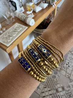 Pulsera elastica con dije en internet