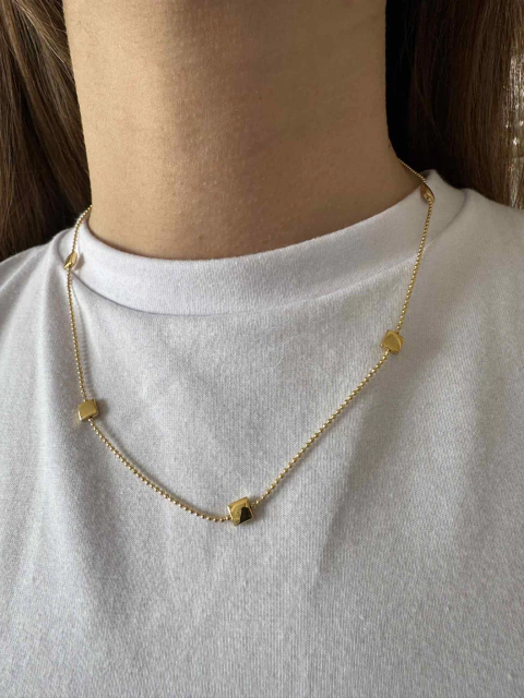Cadena bolita y cuadraditos acero gold