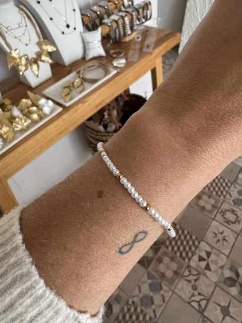 Pulsera elastica perlas acero gold