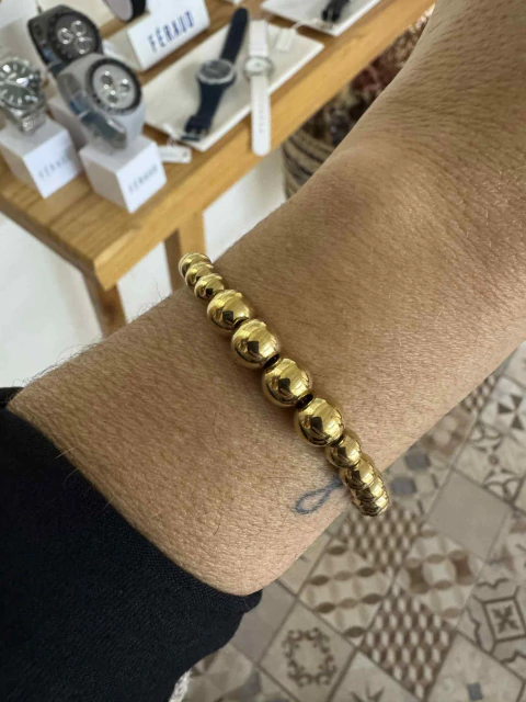 Pulsera con bolitas Delth acero gold - comprar online