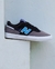 Tênis New Balance Nb Numeric Jamie Foy 306 Masculino em cinza e preto, posicionado sobre uma superfície branca.