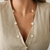Colar Trevo Branco 70cm - Banhado a Ouro 18K - comprar online