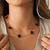 Colar Trevo Preto 50cm - Banhado a Ouro 18K - comprar online