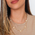 Colar Trevo Menor Cravejado, banhado a ouro 18K.