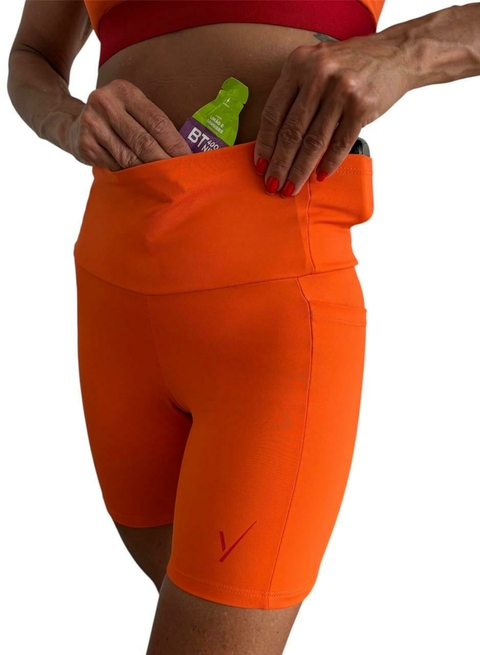 Short Fast 6 Bolsos | Tecido de Compressão Emana Laranja - comprar online