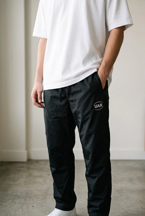 JOGGING PANT LE COQ SPORTIF IMPERMEABLE NEGRO UAR LTN0124007
