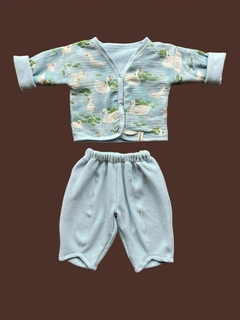 Saquito reversible Cisne + polar celeste en internet