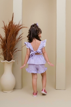 Conjunto infantil bordado + laço de cabelo lilás na internet