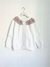 Cardigan blanco con rosa