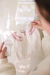 Cardigan blanco con rosa - comprar online