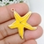 PINGENTE ESTRELA DO MAR CANDY METAL DOURADO - 1 UNIDADE na internet