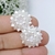 APLIQUE FLOR GIRASSOL PÉROLA - 5 GRAMAS - comprar online