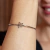 Bracelete Feminino com Estrela e Esfera em Aço Inox BRC31