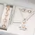Relógio Feminino com Pulseira de Couro Moda Strass Kit com 6 pçs/ Relógio de Pulso - Pulseira - Colar - Anel - Par de Brincos - comprar online