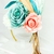 Imagem do Tiara Mix de Flores com Penas e Detalhes Dourados com Tassel de Paete