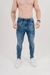 Calça Skinny Jeans Destroyed Marmorizada na internet
