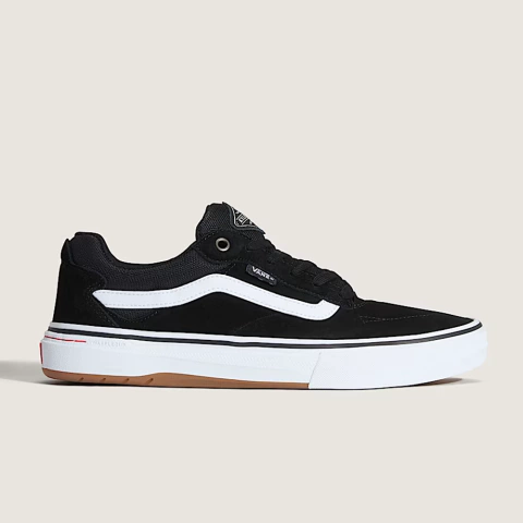 Tênis Vans Kyle Walker Wafflec preto e branco, com detalhe lateral branco e solado de borracha, exibido em fundo neutro.