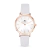 Relógio feminino minimalista com pulseira de couro cinza e caixa rosé gold da marca Saint Germain.