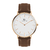 Relógio Clássico Rosé Gold 40mm com pulseira de couro marrom e mostrador branco minimalista, edição limitada da Saint Germain.