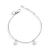Delicate silver bracelet with two coin pendants on a fine chain, designed for women.