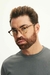 Homem usando óculos de grau redondo Duna Tortoise Latte, com armação em acetato tartaruga, exibindo estilo moderno e sofisticado.