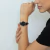 Woman wearing a Women's Black Watch with Leather Strap Murray Black Hill 32mm