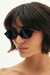 Woman wearing Siena Black Sunglasses with round black frames