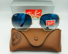 Óculos de Sol Ray Ban Hexagonal Dourado Azul Degrade na internet