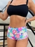 CULOTTE TIRO ALTO CON FRUNCE Y TIRA REGULABLE FLORES FONDO ROSA - AC TIENDA