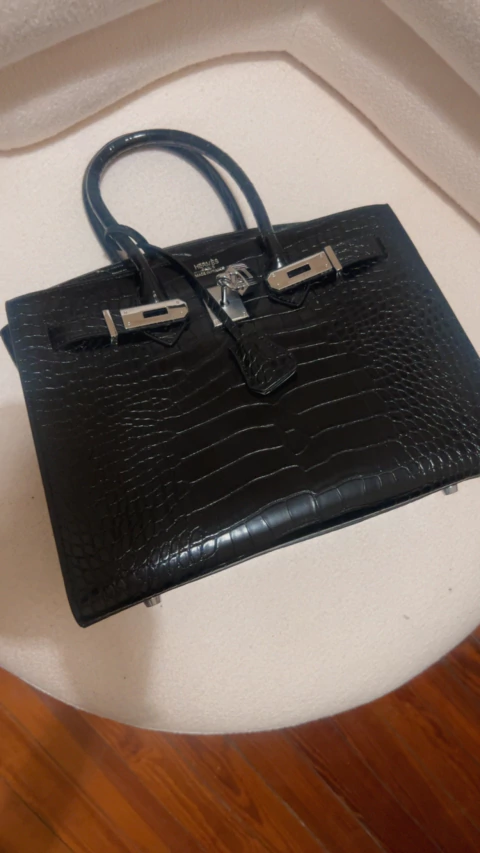 Cartera de mano Hermès vintage piel grabada