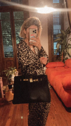 Imagen de Cartera Birkin Hermes vintage de mano con detalles metálicos