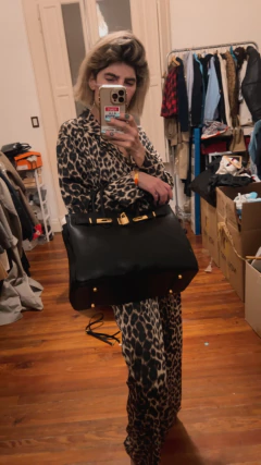 Cartera Birkin Hermes vintage de mano con detalles metálicos